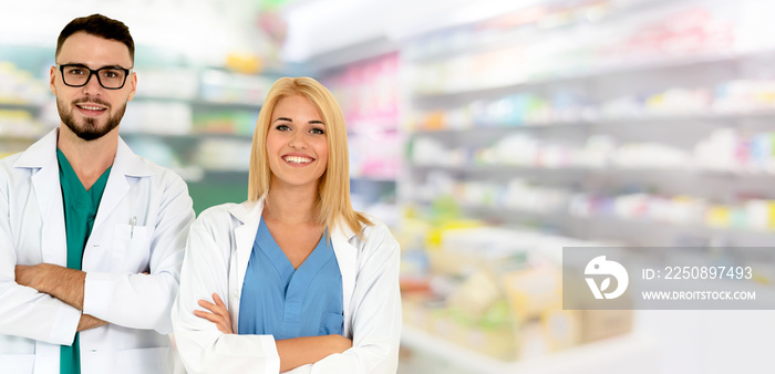 Pharmacist working with another pharmacist in the pharmacy. Healthcare and medical service.