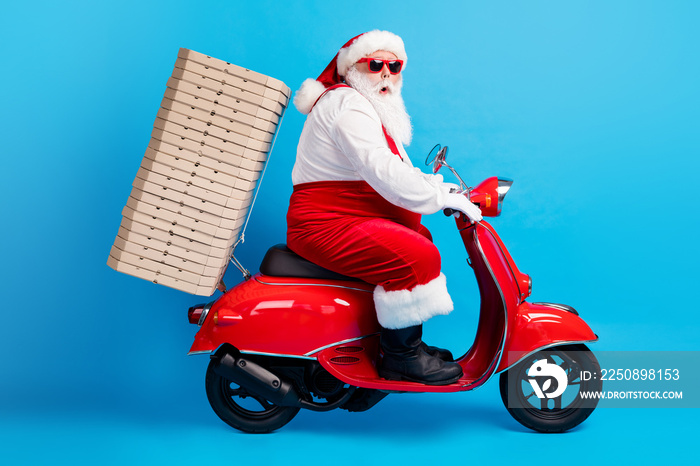 Full size profile side photo of stylish modern santa claus with big belly grey beard drive scooter d