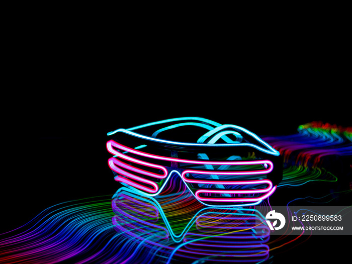 neon glasses are on a colored background