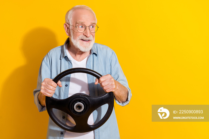 Portrait of attractive cheerful grey-haired man driving rental order copy space ad insurance isolate