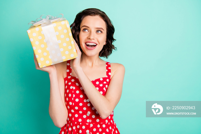 Photo of beautifully looking charming nice attractive woman intending to gift someone this box with 
