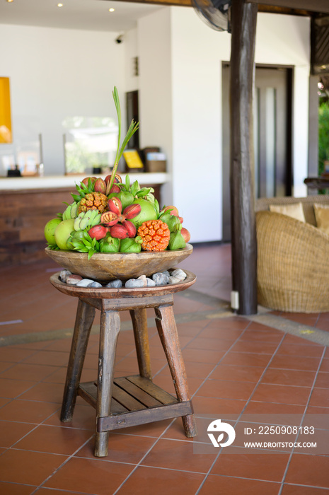 View of various exotic fruit presented at reception desk of hotle.