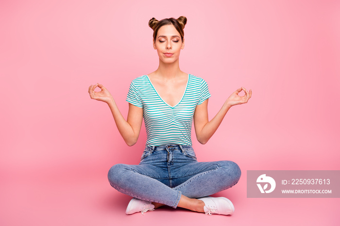 Portrait of her she nice-looking lovely charming cute cheerful content girl sitting on floor meditat