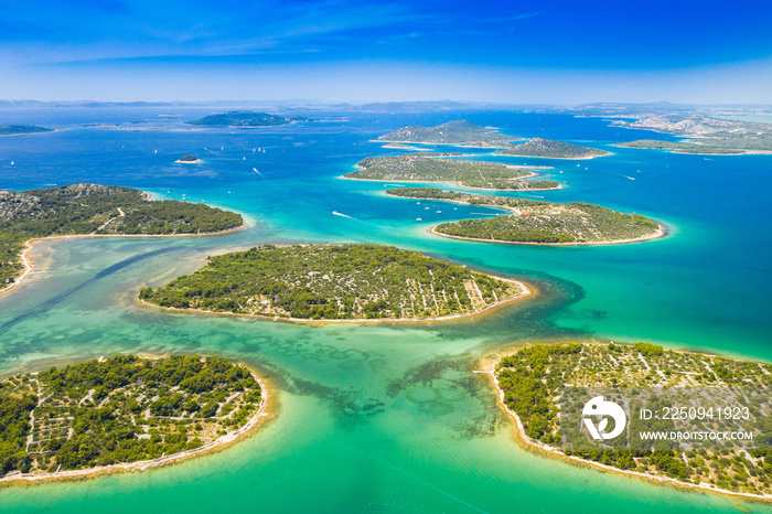 Croatian coast, beautiful small Mediterranean stone islands in Murter archipelago coastline, aerial 