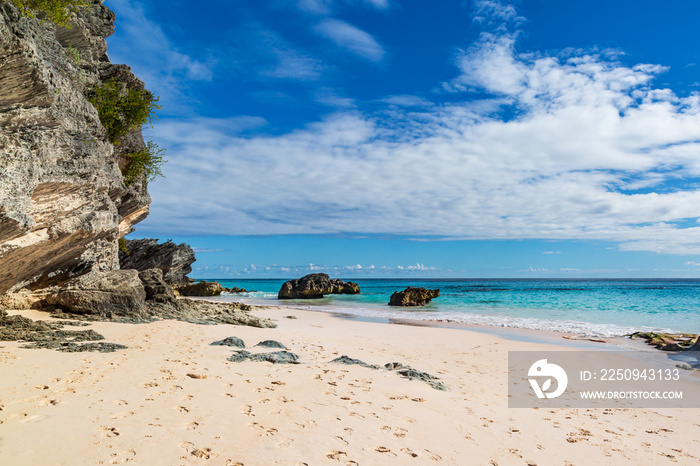 Rock formations and the sandy beach at Horseshoe Bay, on the island of Bermuda