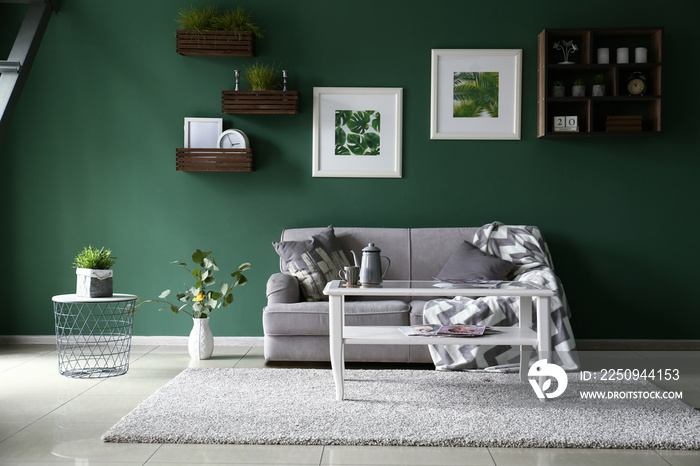 Interior of beautiful modern room with green wall