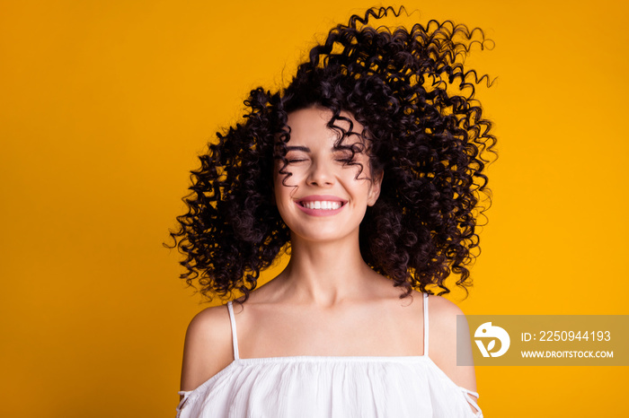 Photo of funky young girl having fun closed eyes toothy smile wear white blouse isolated yellow colo