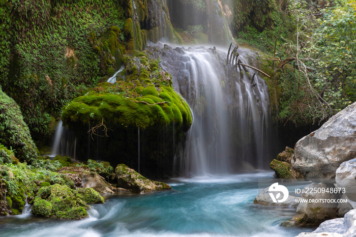 waterfall in the woods. long exposure 