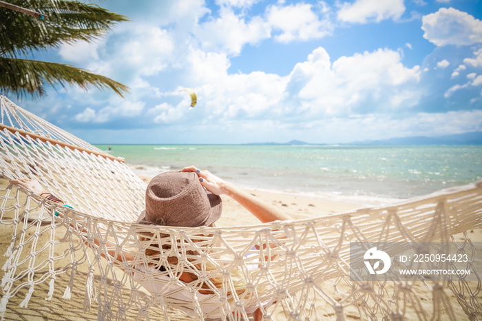 Woman on hammock. Lifestyle concept. Summer vacation. Nature concept. Summer tourism, travel. Carefr