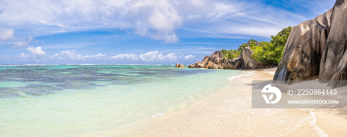 Famous granite boulders in blue lagoon on amazing Anse Source DArgent tropical beach,   Seychelles.