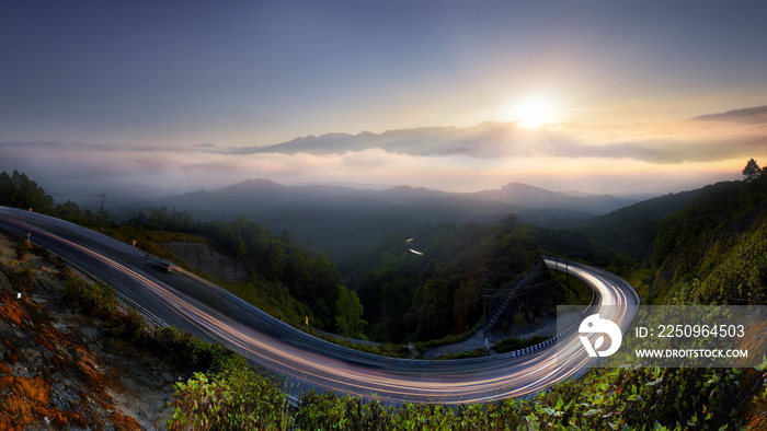 The Long road in to nature , morning mist sunrise at  Doi  Inthanon, Chiang Mai, Thailand .