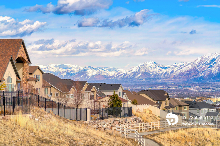 Hill houses overlooking scenic panorama of the valley and snowy Wasatch Mountain