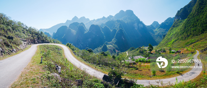 Ha Giang karst geopark mountain landscape in North Vietnam. Winding road in stunning scenery. Ha Gia