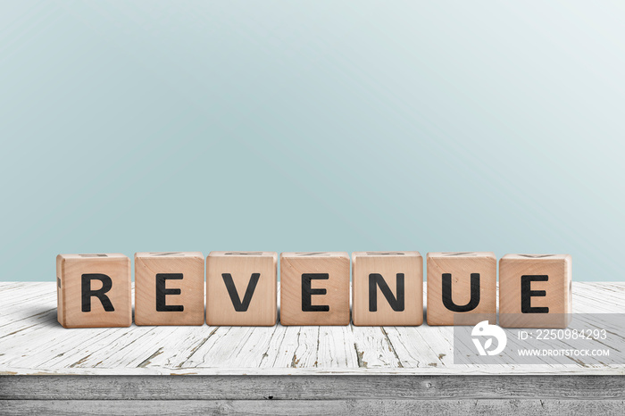 Revenue sign on a wooden desk