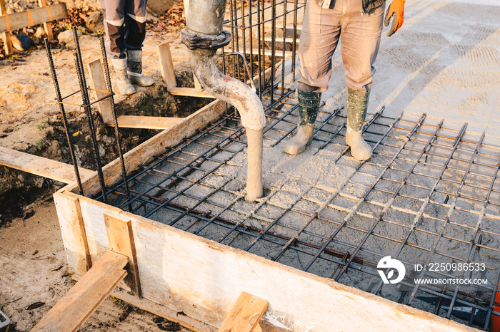 Concrete pouring during commercial concreting floors of buildings in construction site