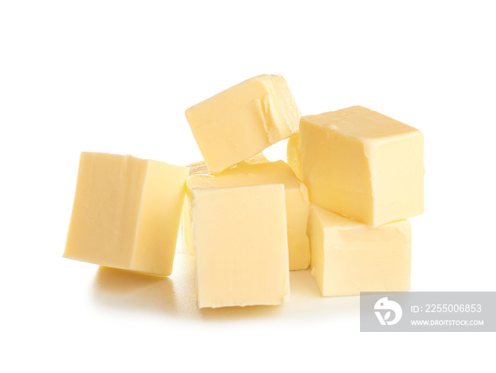 Pieces of fresh butter on white background