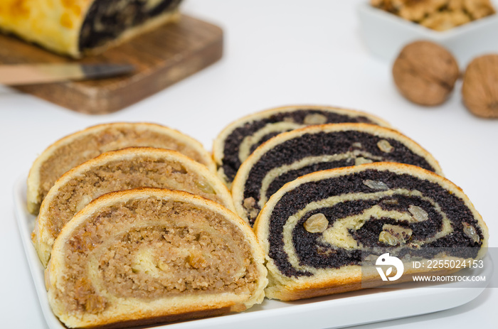 Sliced beigli. Beigli - hungarian poppy seed and walnut rolls