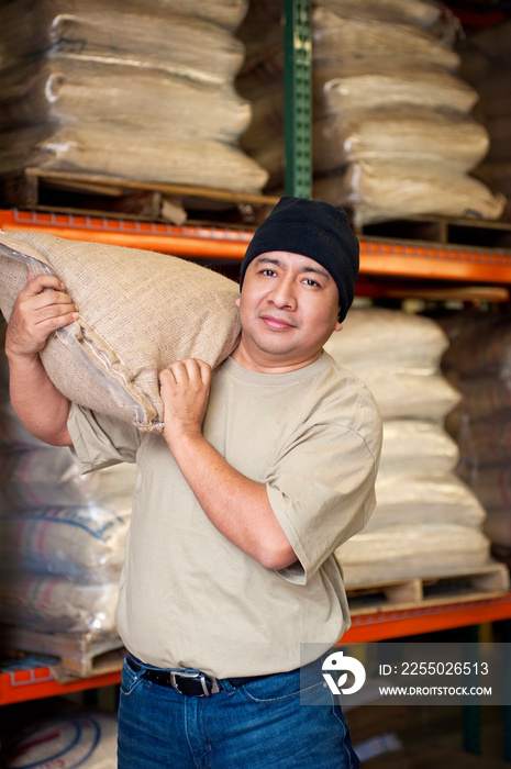 Portrait of manual worker at warehouse