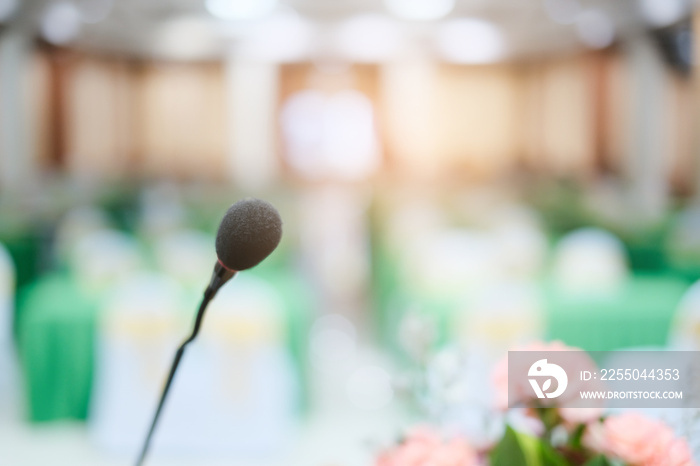 Close up microphone attached in stand on stage, concept of giving presenting and speech discussing i