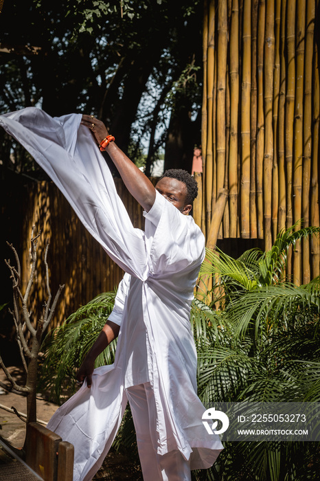 a man moving freely in a garden