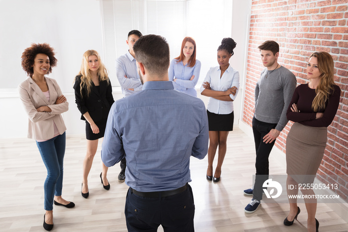 Manager Having Conversation With His Business Colleagues