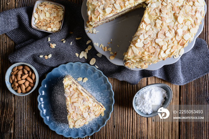 Mandeltarta, creamy Swedish almond cake topped with toasted almond flakes