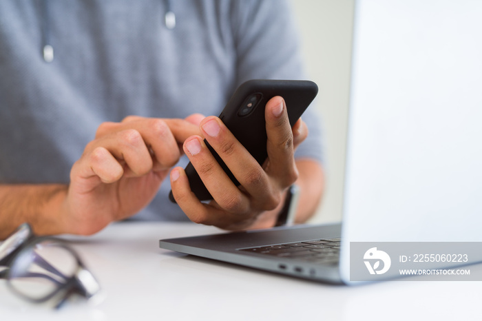 Close up of man using smartphone