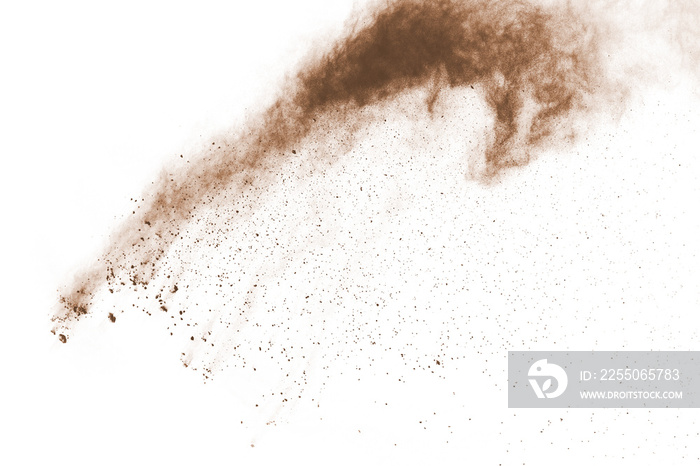 Brown powder explosion isolated on white background.