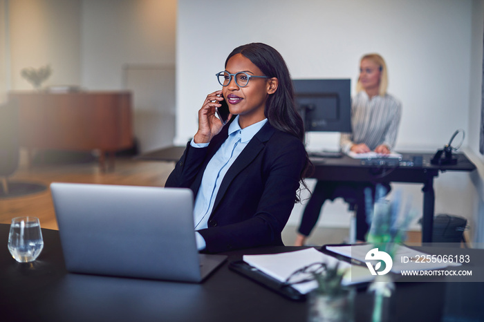 African American businesswoman talking on a cellphone in her off