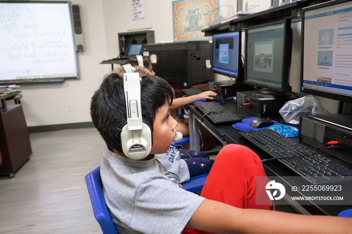 Children using a computer at school