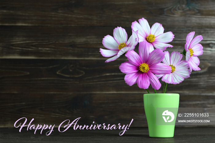 Happy Anniversary card with flowers in the vase