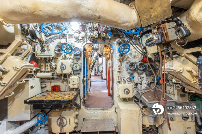 Interior of old abandoned Russian Soviet submarine. Interior of combat submarine compartment with devices of control