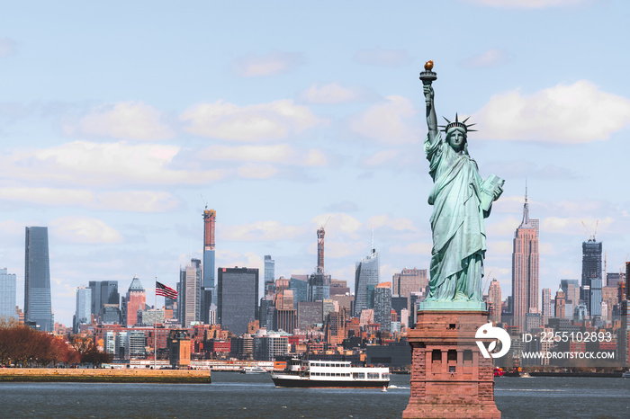 The Statue of Liberty over the Scene of New york cityscape river side which location is lower manhattan,Architecture and building with tourist concept