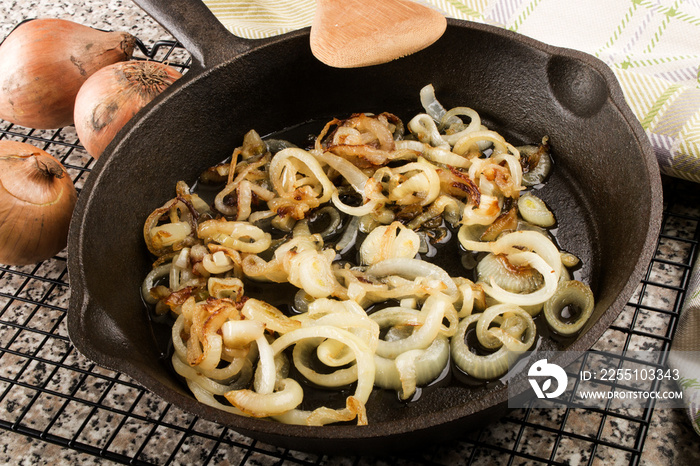 roasted onions in a cast iron pan