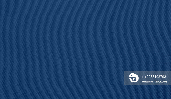 Blue cotton background. fabrics from natural textile materials. Pattern texture blue dark cloth concept