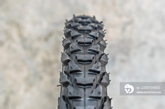 closeup of new shining black mountaineer tire