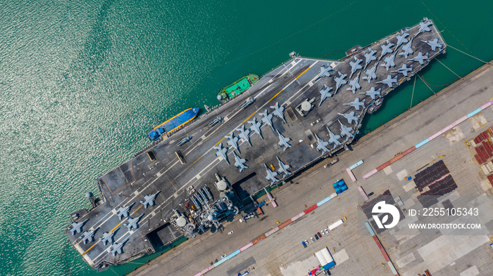 Navy Nuclear Aircraft carrier, Military navy ship carrier full loading fighter jet aircraft, Aerial view.