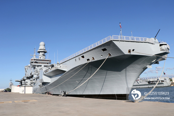 The Italian aircraft carrier ship Cavour moored at the military naval base of Taranto, Puglia, Italy