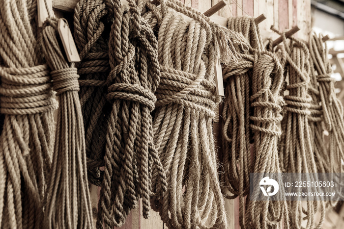 handcraft ship ropes hang on wooden wall