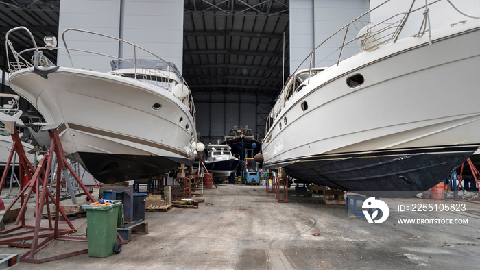 Yachts parked at the marina quayside in the off-season