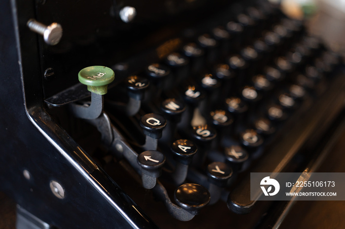 vintage typewriter keys with selective focus. Antique Typewriter. Vintage Typewriter Machine Closeup Photo.