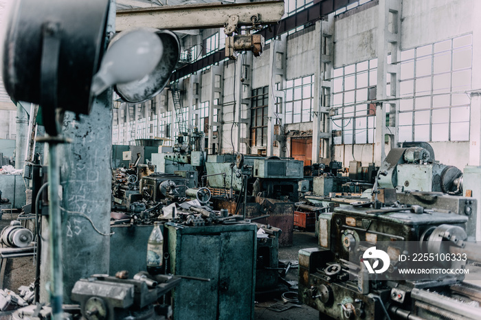 Old equipment, machines, tools in a rustic style in an abandoned mechanical factory