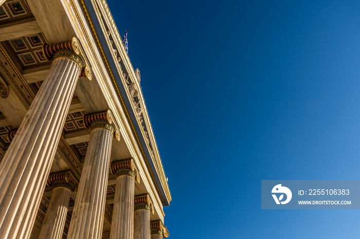 Classical marble pillars detail on the facade of a building