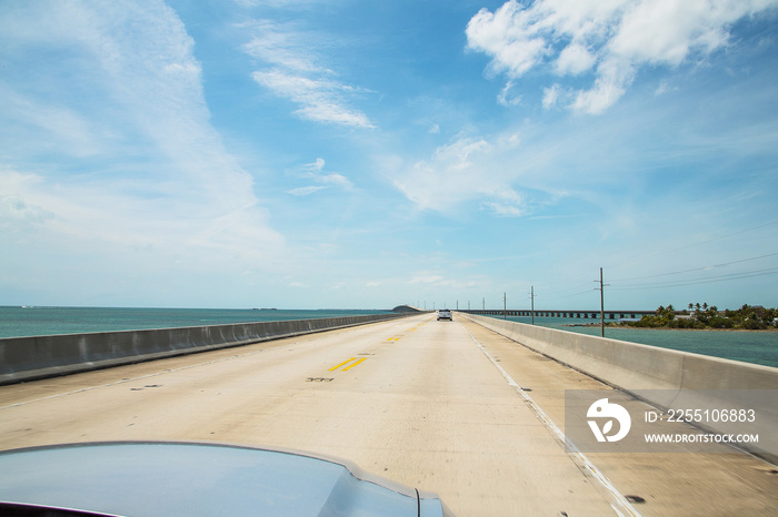 Beautiful endless road from Miami to Key West driving Ford Musta