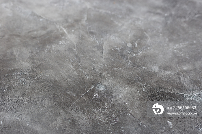 Texture of a grey stone background. Dark Cement and concrete texture, selective focus.