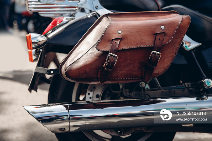 Traveler bag for motorcycle made of leather, brown. Concept freedom of movement