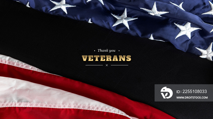 Happy Veterans Day concept. American flag and inscription with congratulations against a black background.