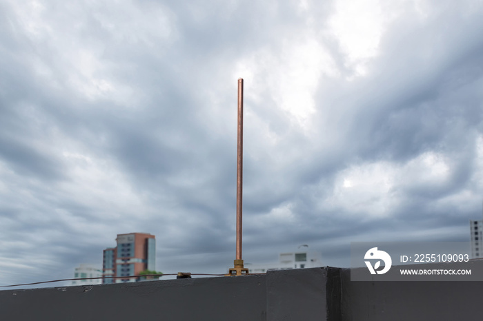 Lightning rod for Lightning protection and protect electrical equipment damage when lightning strike. Air terminal rod and bare copper cable install on rooftop building