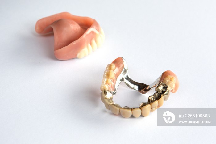 closeup of dental prosthesis on white background