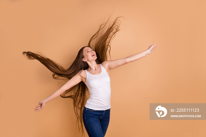 Close up photo beautiful her she lady hands arms raised eyes closed overjoyed weather warm wind breeze hair flight inspired wear casual white tank-top jeans denim isolated pastel beige background